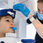 Young boy getting a dental x-ray.