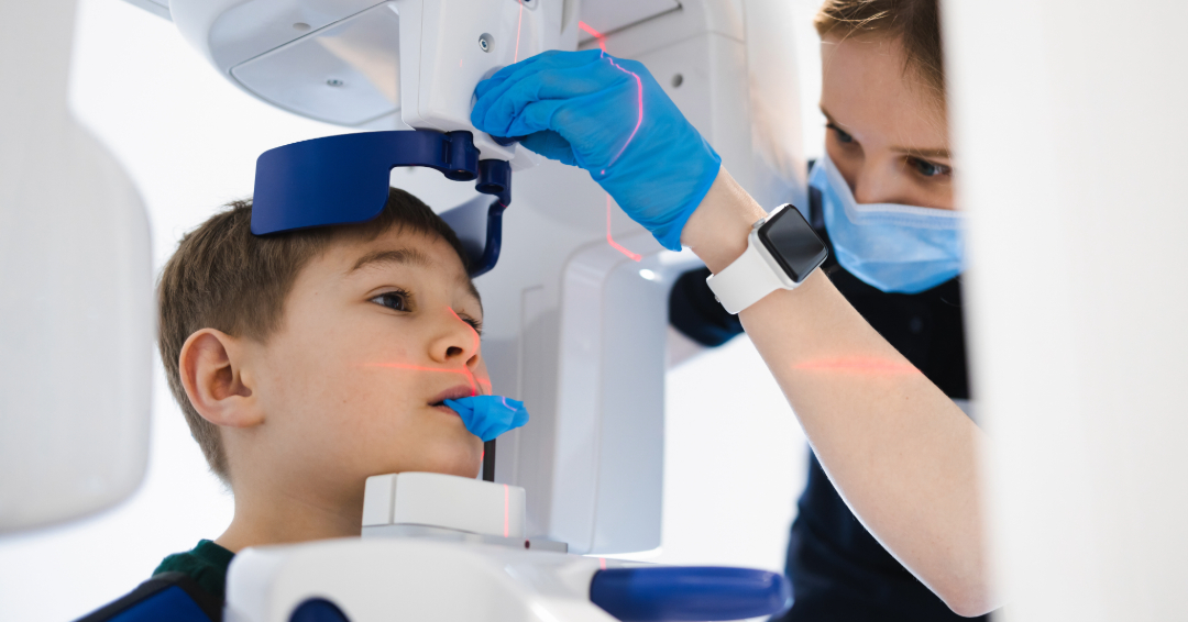 Young boy getting a dental x-ray.