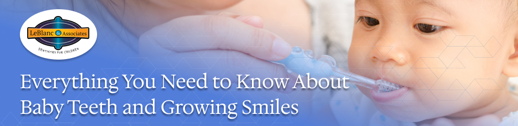 parent brushing baby’s teeth